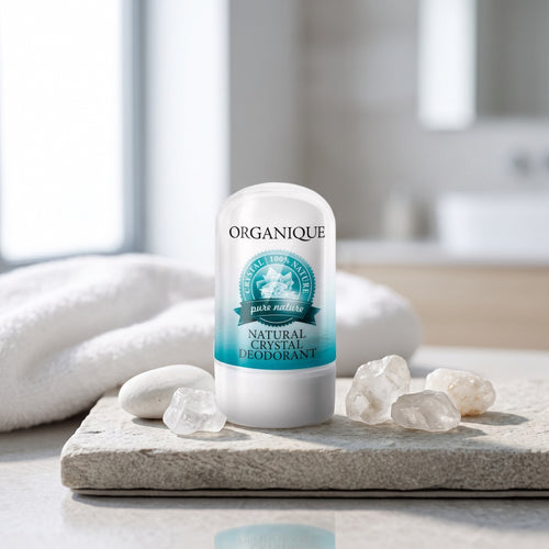 Alum Natural Crystal Deodorant 50 g on a stone slab with raw alum crystals