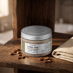 Coffee Sugar Scrub 450 ml on a dark wooden shelf with coffee beans