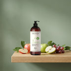 Polyplant Fruits Shower Gel 1000 ml on an oak shelf with fresh fruit